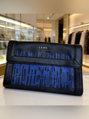 L.A.M.B. Black and Blue clutch